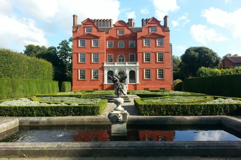 Kew Palace at Kew Gardens, a modest red-brick Georgian royal residence surrounded by manicured gardens